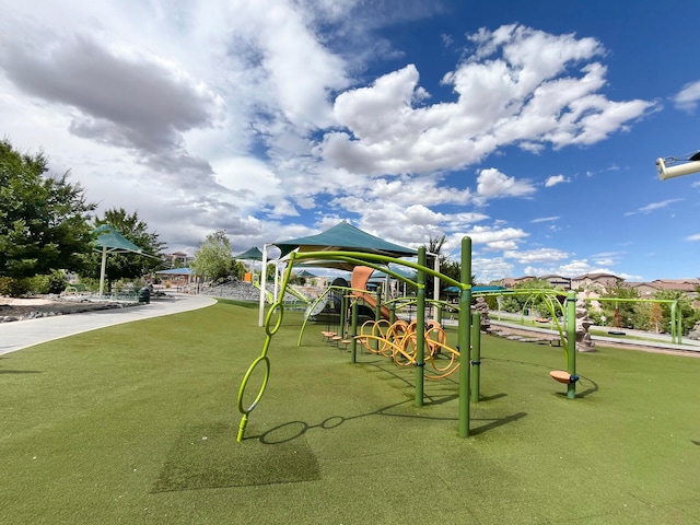 surrounding community featuring a playground and a gazebo