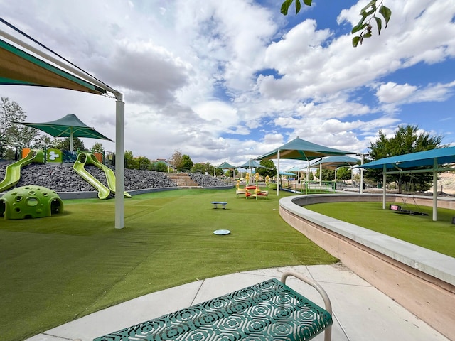 view of property's community with a playground and a gazebo