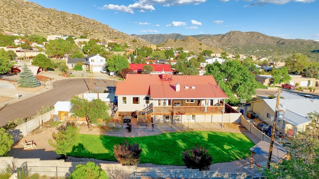 drone / aerial view featuring a mountain view