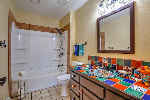 full bath featuring visible vents, toilet, tile patterned flooring, tub / shower combination, and vanity