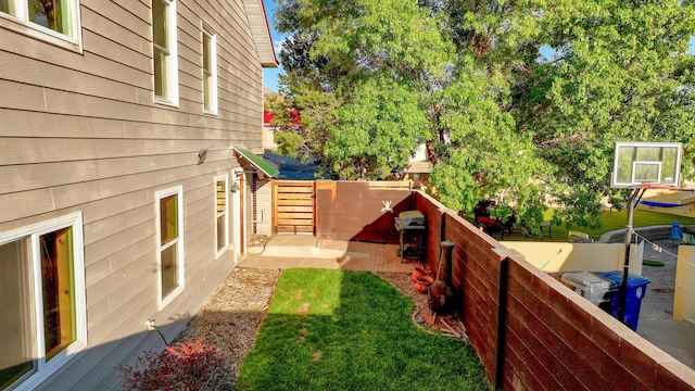 view of yard with fence