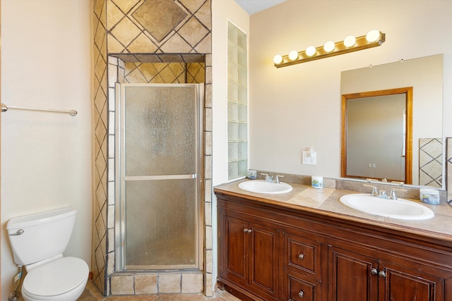 bathroom with walk in shower, vanity, and toilet