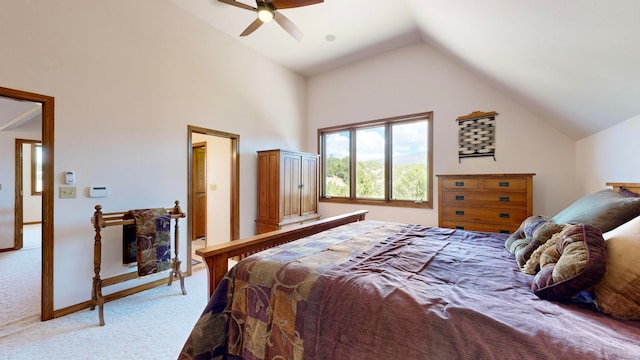 bedroom with light carpet, lofted ceiling, and ceiling fan