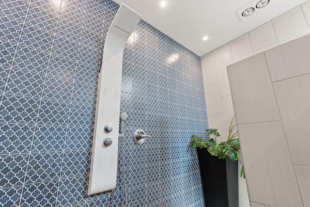 interior space featuring a tile shower