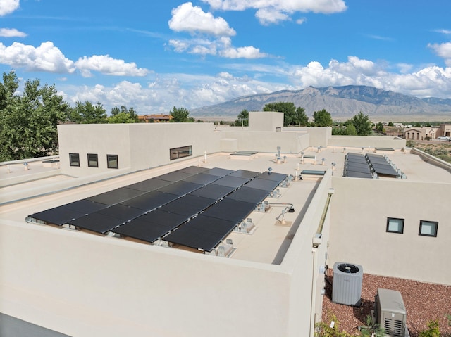 exterior details with a mountain view and central AC