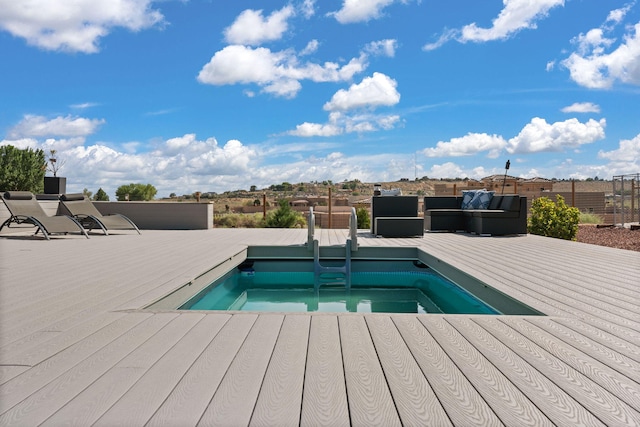 view of pool featuring a deck