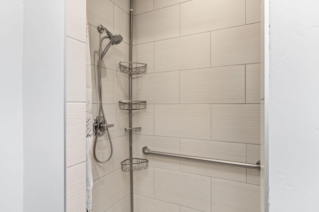 room details with a tile shower