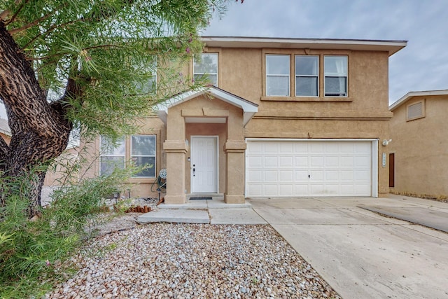 view of front of property with a garage