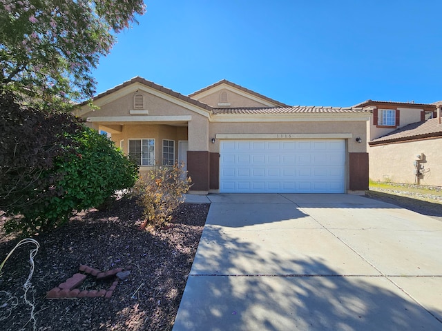 view of front of property with a garage