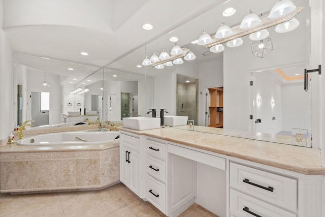 bathroom with separate shower and tub, vanity, and tile patterned floors