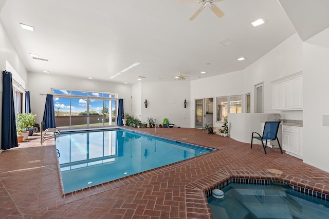 indoor pool with an indoor hot tub