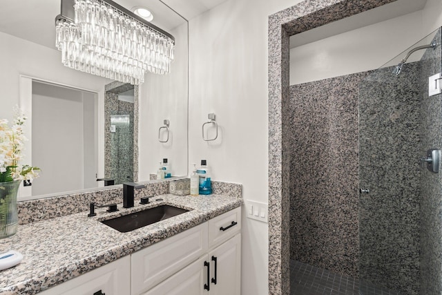 full bathroom with a shower stall and vanity