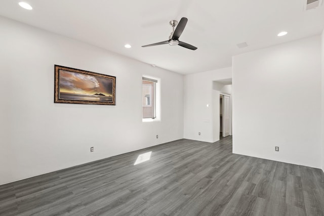 unfurnished room featuring a ceiling fan, recessed lighting, visible vents, and wood finished floors