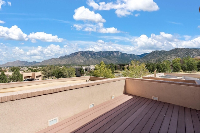 deck with a mountain view