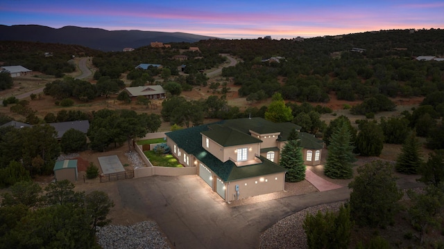 aerial view at dusk with a mountain view