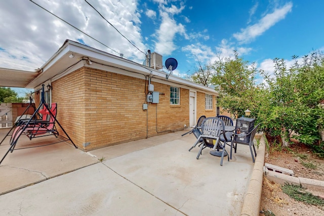 rear view of house featuring a patio