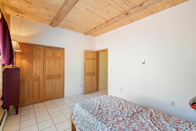 bedroom featuring light tile patterned floors, baseboard heating, beamed ceiling, and wooden ceiling