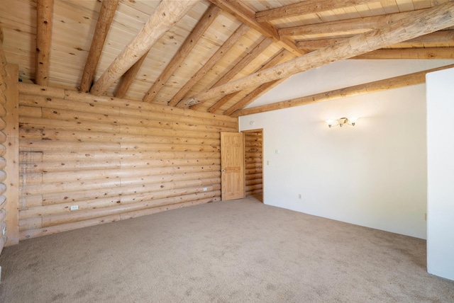 carpeted spare room with wooden ceiling and lofted ceiling with beams