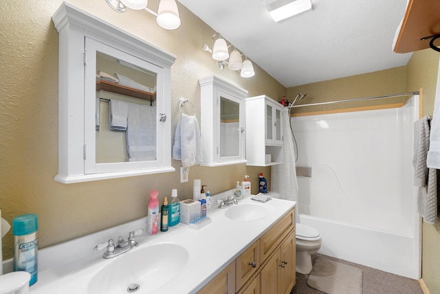 full bathroom featuring shower / bath combination, toilet, and vanity