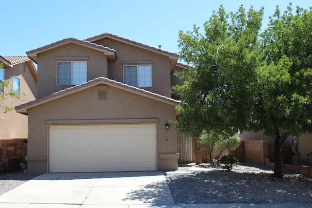 front of property with a garage