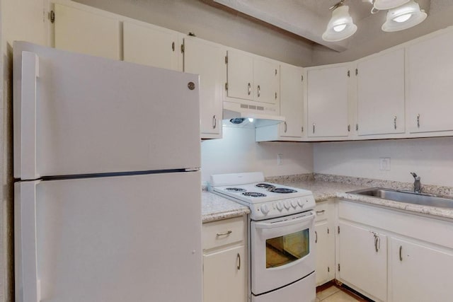 kitchen with white cabinetry, sink, light tile patterned flooring, and white appliances