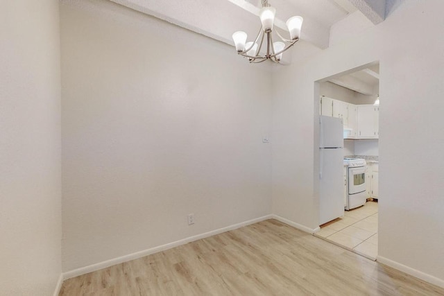 unfurnished dining area featuring beam ceiling, a notable chandelier, and light hardwood / wood-style floors