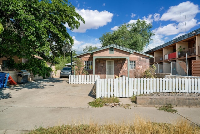 view of front of home with a balcony