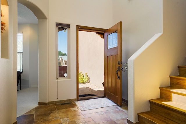 foyer with plenty of natural light