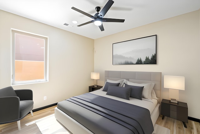 bedroom featuring ceiling fan and light hardwood / wood-style floors