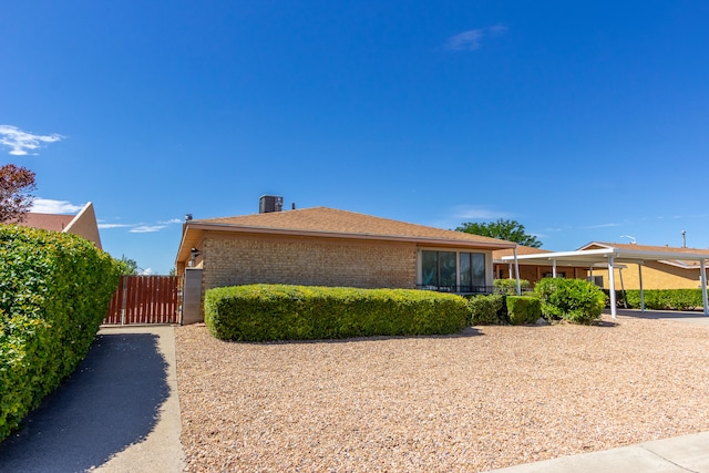 view of front of house featuring central AC unit