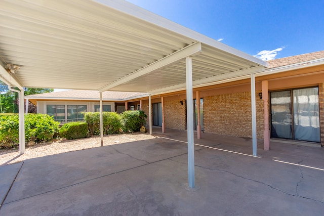 view of patio / terrace featuring a carport