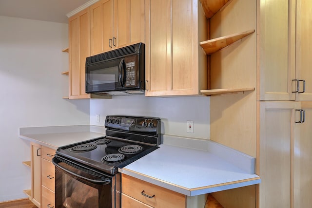 kitchen with black appliances, open shelves, and light countertops