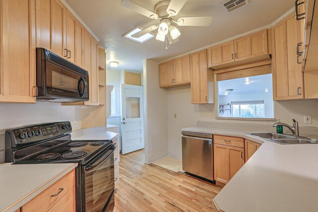 kitchen with ceiling fan, sink, light hardwood / wood-style flooring, light brown cabinetry, and black appliances