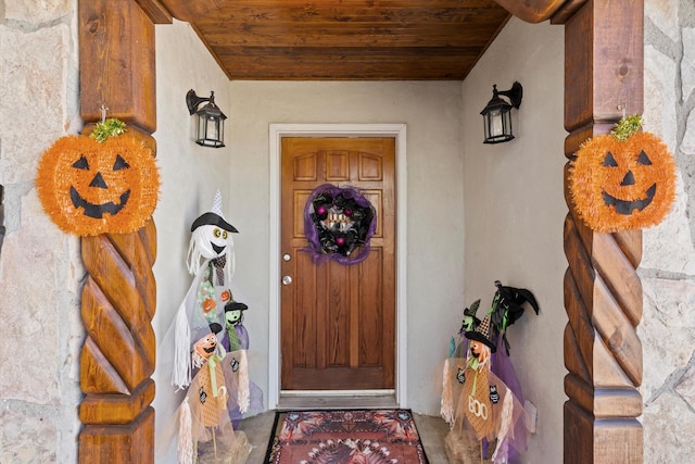 doorway to property with stucco siding
