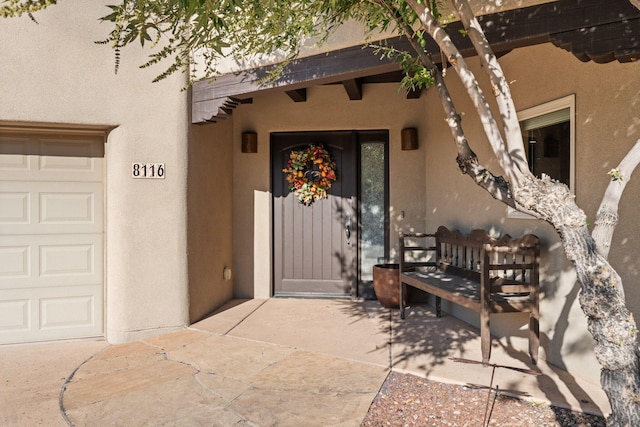 property entrance featuring a garage