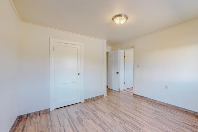 unfurnished bedroom with light wood-type flooring