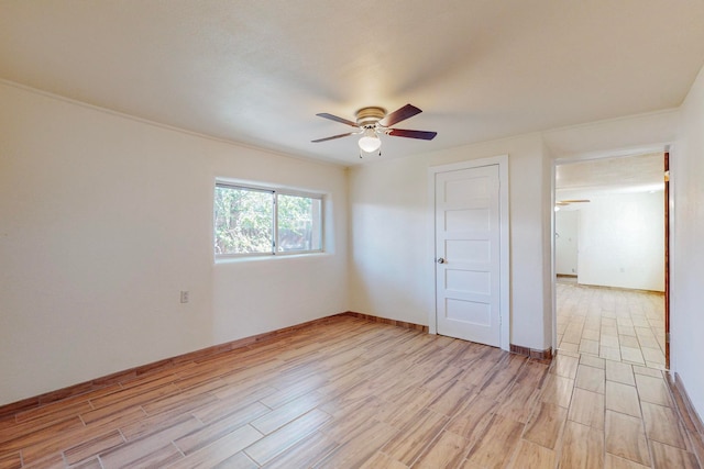 unfurnished bedroom featuring ceiling fan and light hardwood / wood-style floors