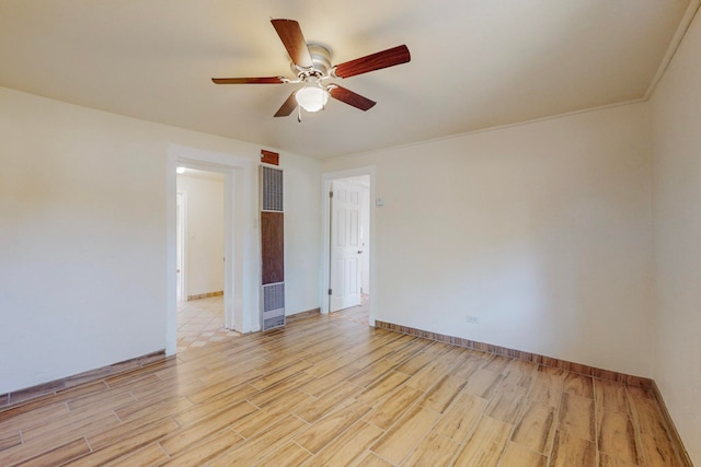 empty room with light wood-type flooring and ceiling fan