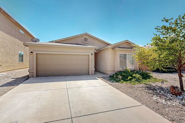 ranch-style house featuring a garage