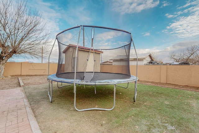 view of yard featuring a trampoline