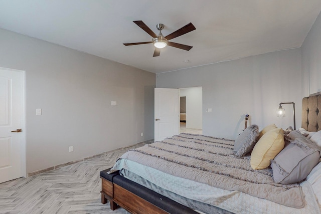 bedroom featuring light parquet flooring and ceiling fan