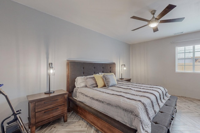 bedroom with visible vents and ceiling fan