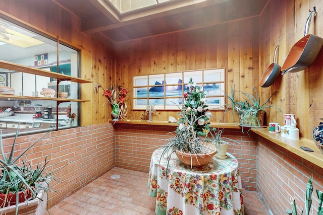 interior space featuring wooden walls