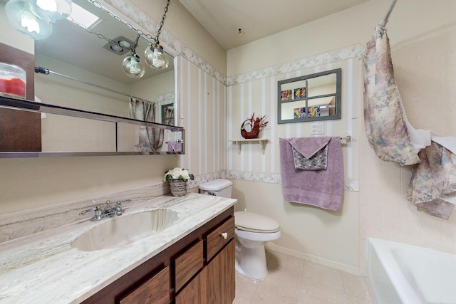 full bathroom featuring tile patterned flooring, toilet, shower / tub combo, and vanity