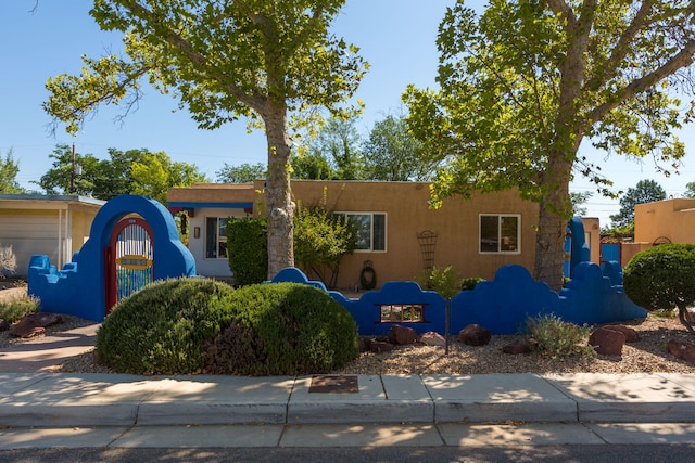 view of pueblo revival-style home