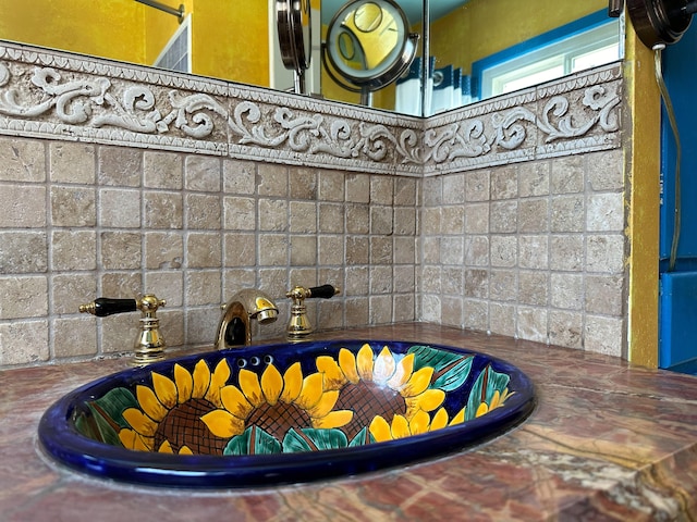 interior details with backsplash and sink