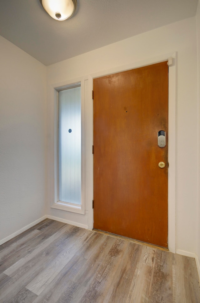 entrance foyer featuring light hardwood / wood-style floors