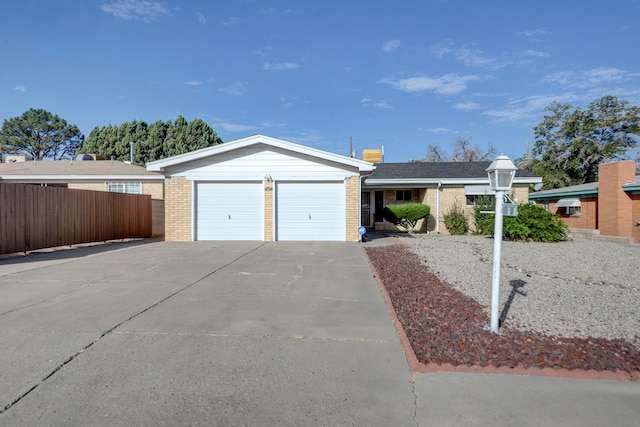 single story home featuring a garage