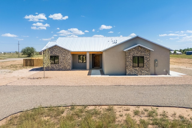 view of front of home featuring a patio area