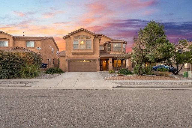 view of front of property with a garage